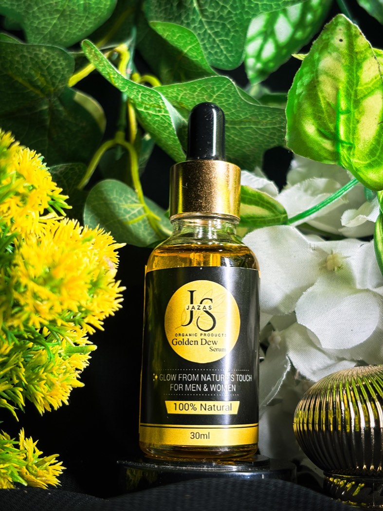 Golden Dew Serum styled with botanicals